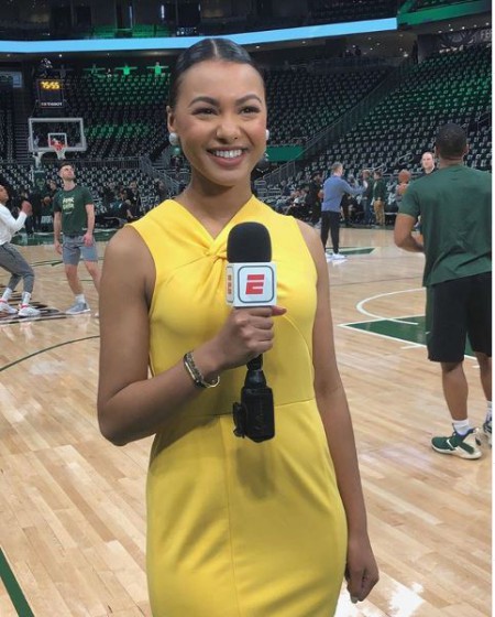 Malika Andrews reporting for ESPN at the match between Celtics and Milwaukee Bucks